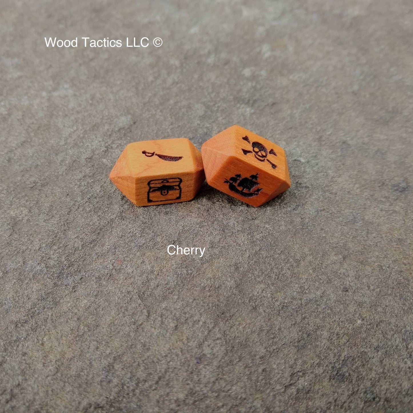 Cherry Hardwood Barrel D4 dice for bluffaneer game. Symbols are Pirate Ship, Skull and Pones, Treasure Chest and Sword.