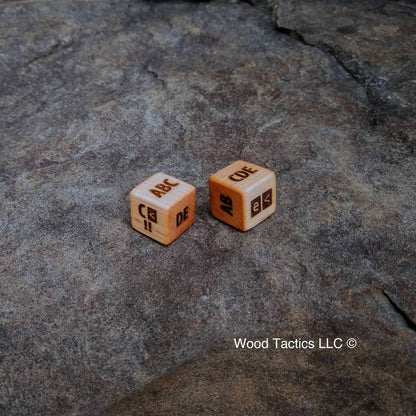 CDG Solo System Maple Hardwood D6 Dice with CDE, AB, ABC, DE, E< and C<!! Symbols