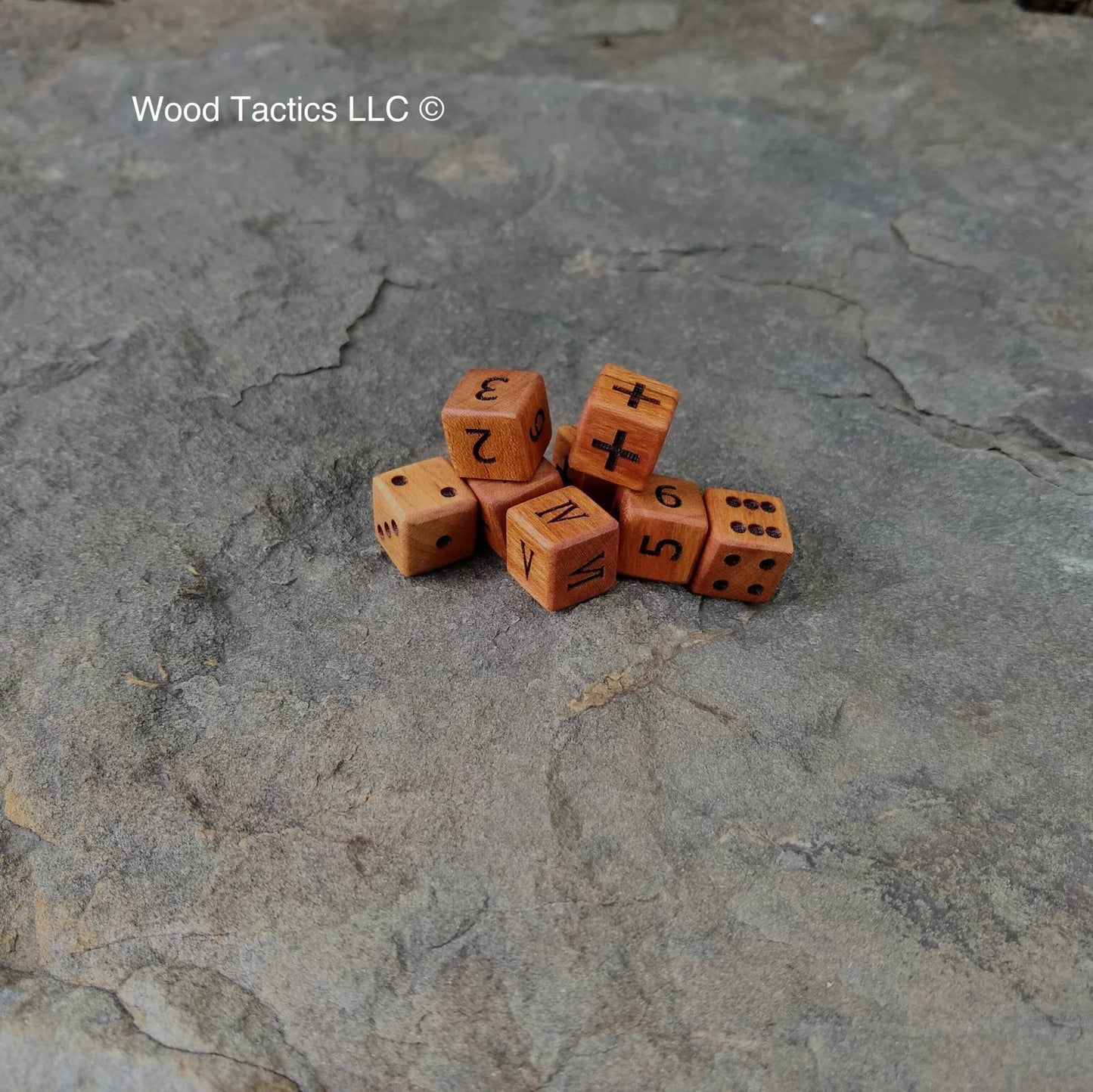 Cherry Hardwood D6 12mm Dice with Pips, Numbers, Roman Numerals and Fate Symbols.