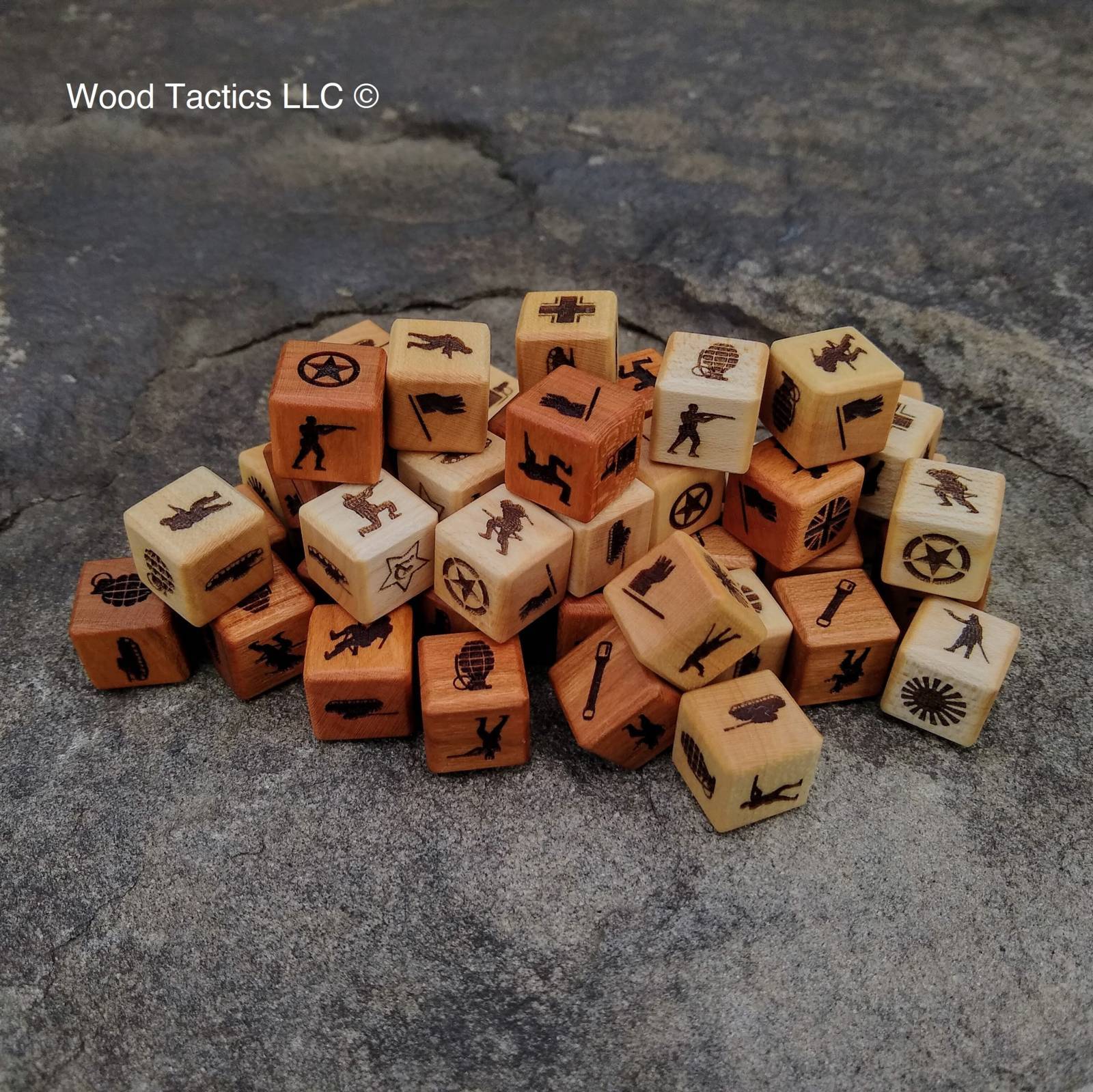 Various Hardwood Memoir 44 game dice, with faction symbols for USA, Germany, Japan, USSR, and UK or the original symbols